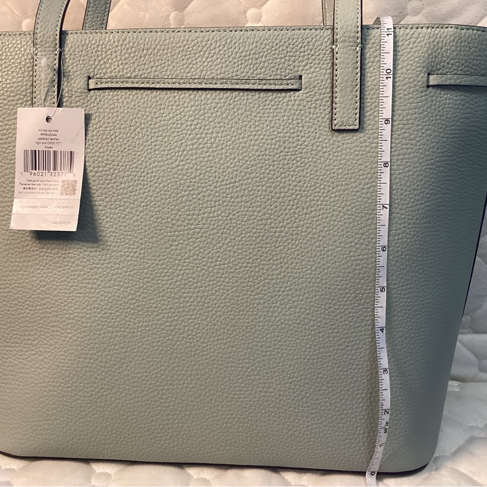 Kate Spade NWT sea foam green pebbled leather tote with bow tie tassel on front - Picture 14 of 15